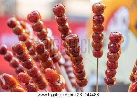 Tanghulu Traditional Chinese Hard Caramel Coated Fruit Skewers Close-up Also Called Bing Tanghulu Ca
