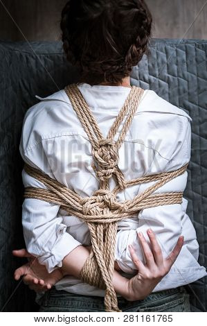 Woman Bound With A Rope In Japanese Technique Shibari