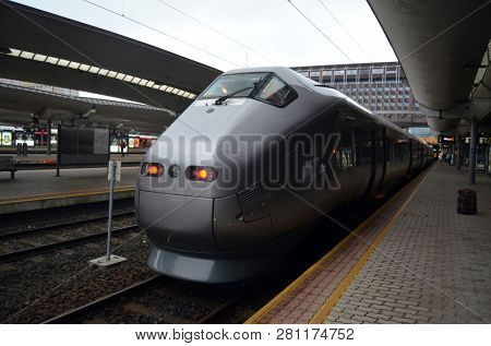 Platform and train view on Oslo central station. Oslo Central Station (Sentralstasjon) is main railway station in Oslo. June 14. 2018. Oslo,Norway