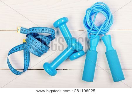 Healthy Lifestyle And Losing Weight. Barbells, Centimeter And Jump Rope