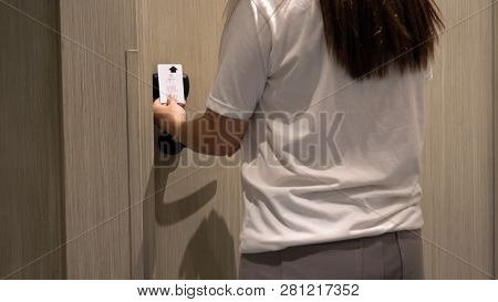 Closeup Hand Woman Using An Electronic Security Key Card For Opens The Door Of Her Hotel Room, Holid
