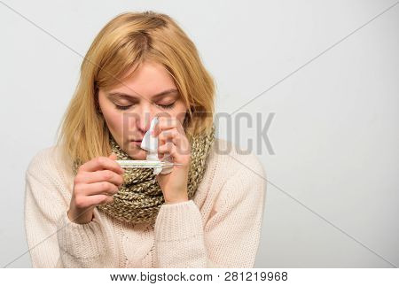 Girl In Scarf Hold Thermometer And Tissue Close Up. Cold And Flu Remedies. High Temperature Concept.