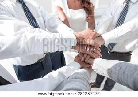 close - up of business team with a stack of hands