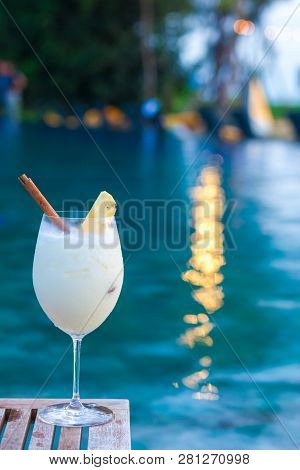Delicious Pina Colada Cocktail By The Luxury Evening Pool