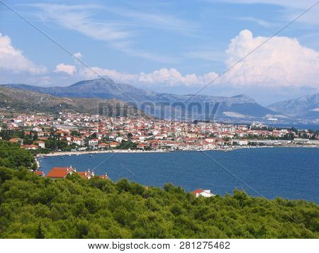 View Of Picturesque Landscape Of Old City With Red Tiled Roofs, Blue Sea, Pinnate Clouds In The Sky,