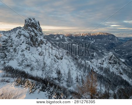 Spectacular Winter Mountain Landscape Illuminated By Setting Sun.