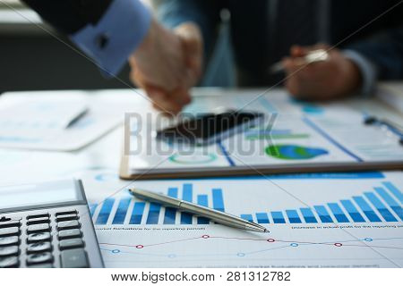 Businessman In Sut Hand Shake In Ofiice Closeup. Introduce Manager Job Man Risk Chart Paper How Deal