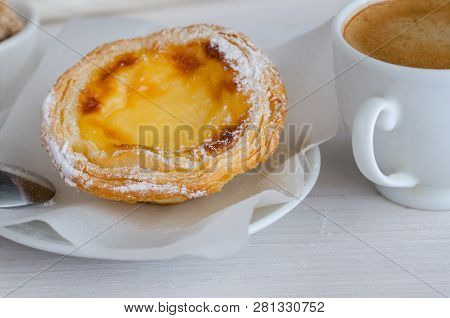 Pasteis de Belem,  portuguese egg tart pastries coffee at Lisbon cafe,Portugal. This weets making to