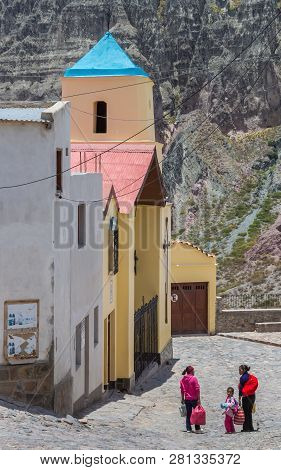 Iruya, Argentina - November 19, 2012: People In Front Of The Colorful Church Of Iruya, Argentina