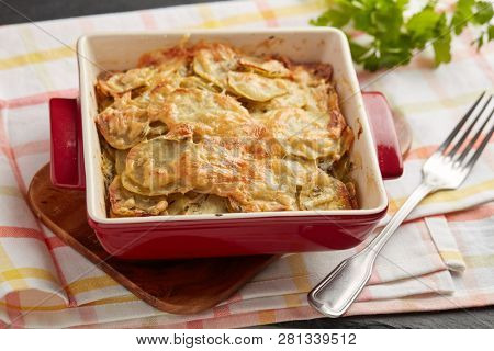 Potatoes a la dauphinoise in a baking dish