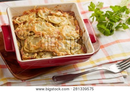 Potatoes a la dauphinoise in a baking dish