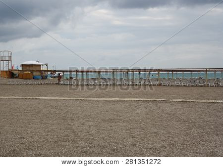 Beach Is Equipped With Chaise-longues And Lifeguard Post