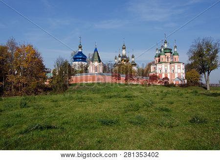 Old Sviato-troitskyi Monastery On A Background Of Autumn Trees In Gustynya. Chernihiv Region. Ukrain