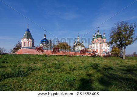 Sviato-troitskyi Monastery Against The Blue Sky In Gustynya. Chernihiv Region. Ukraine. Horizontal O