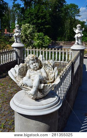 Sculptures Of Angels In Hoetsky Manor, Tomashevka, Kiev Region, Ukraine. Vertical Outdoors Shot.