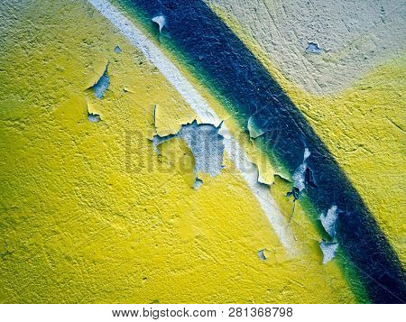 old wall texture  color yellow  peeling paint