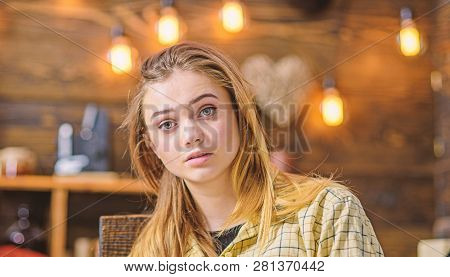 Blond Girl With Big Green Eyes, Angel Face And Gorgeous Hair Posing Indoors. Teenage Female With Amu