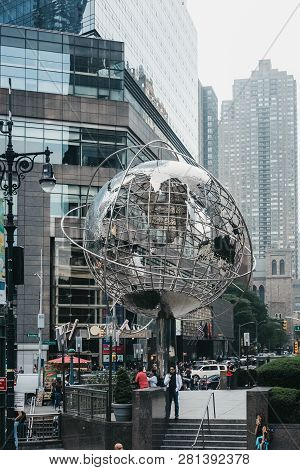 New York, Usa - June 01, 2018: People Near Globe Sculpture By Kim Brandell At Columbus Circle, New Y