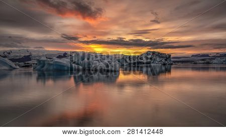 Sunset At Jokusarlon Glacial Lagoon In Southeast Iceland.