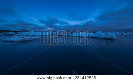 Faint Aurora Borealis At Jokusarlon Glacial Lagoon, Southeast Iceland.