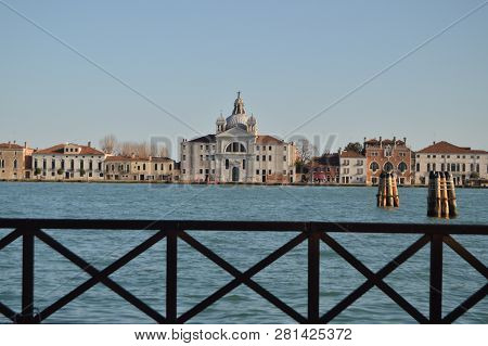 Main Facade Of The Church Of The Presentation Seen Behind A Railing In Venice. Travel, Holidays, Arc
