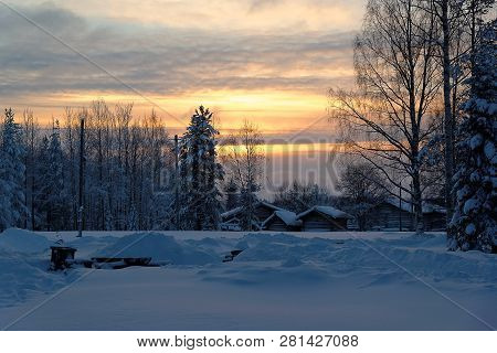 Frosty Sunset In The Village Of Malye Karely, Arkhangelsk Region, Russia, There Is A Lot Of Snow Ahe