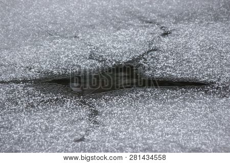 Frozen River Water River With Small Open Water. Transparent Polynya Froze. Little Polynya On Lake. C