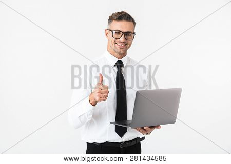 Image of a handsome business man isolated over white wall background using laptop computer showing thumbs up gesture.