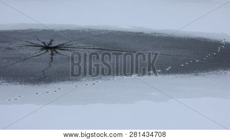 Frozen River Water River With Small Open Water. Transparent Polynya Froze. Little Polynya On Lake. C