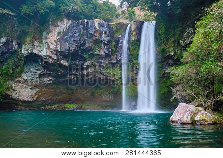 Cheonjiyeon waterfall falls one of tourist attractions of Jeju Island, South Korea