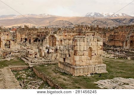 Baalbek - Ruins Of The Great Court Of The Ancient Phoenician City With Range Of Mountains At The Bac
