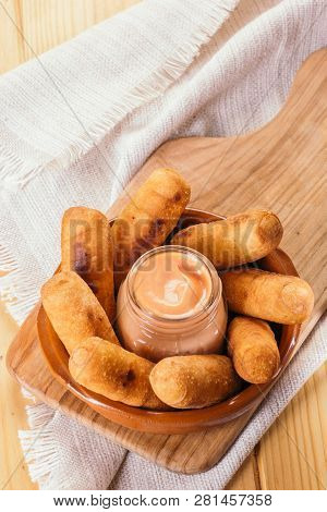 Top View Of Latin-american Appetizers Called Tequeños Made Of Fried Corn Filled With Cheese With A P