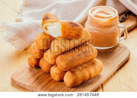 Appetizers Called Tequeños Made Of Fried Corn Filled With Cheese