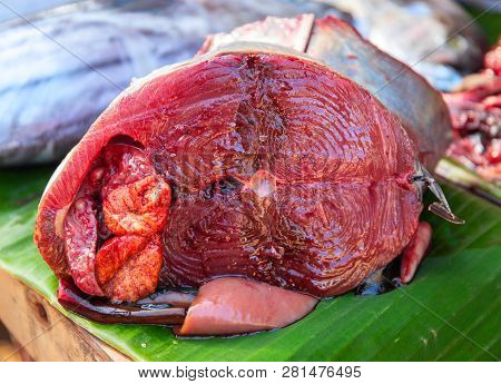 Tuna Fish Cut Closeup Photo. Fresh Sea Fish Close-up. Tropical Seaside Fish Market Table. Tuna Fish 