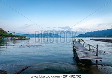 Lake Toba At Sunset - Landscape In Tuktuk, North Sumattra, Indonesia. Lake Toba Is A Popular Tourist