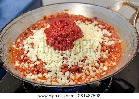 Cooking Pork With Bbq Sauce And Diced Waternuts