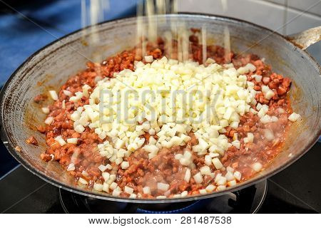 Cooking Pork With Bbq Sauce And Diced Waternuts