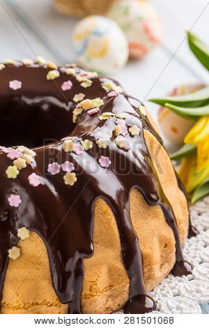 Delicious Holiday Slovak And Czech Cake Babovka With Chocolate Glaze. Easter Decorations - Spring Tu
