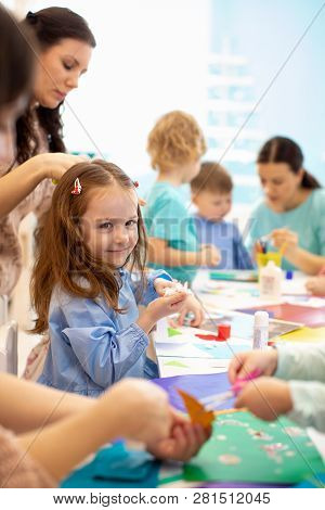 Development Learning Children In Preschool. Childrens Project In Kindergarten. Group Of Kids With Te