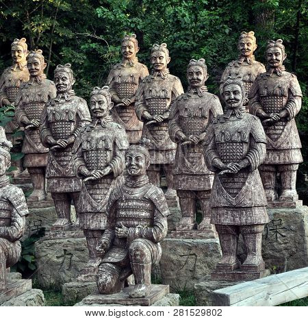 Chinese Dragons, Statues Of Ronin And Fountains At Sunset
