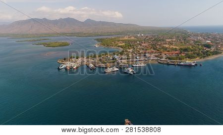 Aerial View Ferry Port Gilimanuk With Ferry Boats, Vehicles. Ferries Transport Vehicles And Passenge