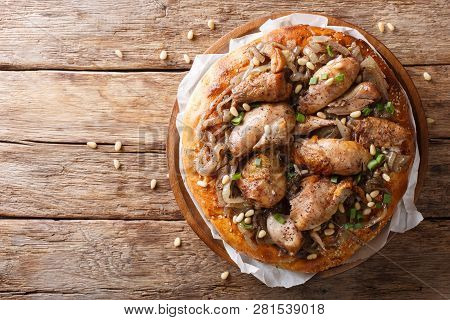 Palestinian Musakhan Or Sumac Chicken Closeup On The Table. Horizontal Top View