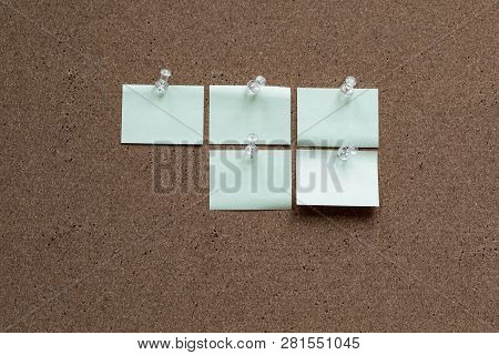 Horizontal Cork Board With Many, Sticky Notes Pinned