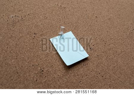Horizontal Cork Board With Many, Sticky Notes Pinned