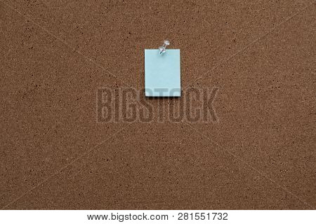 Horizontal Cork Board With Many, Sticky Notes Pinned