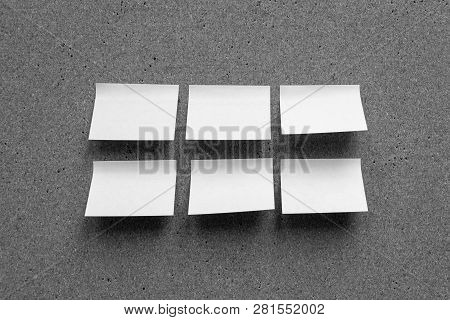 Horizontal Cork Board With Many, Sticky Notes Pinned