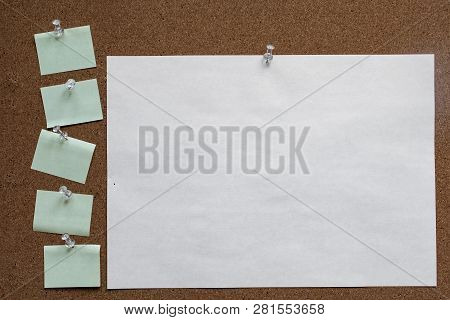 Horizontal Cork Board With Many, Sticky Notes Pinned