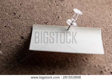 Horizontal Cork Board With Many, Sticky Notes Pinned