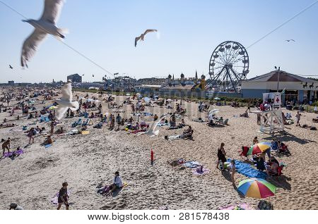 Old Orchard Beach, Maine - August 26: People Enjoy The Beach In Old Orchard Beach, Which Since 1898 
