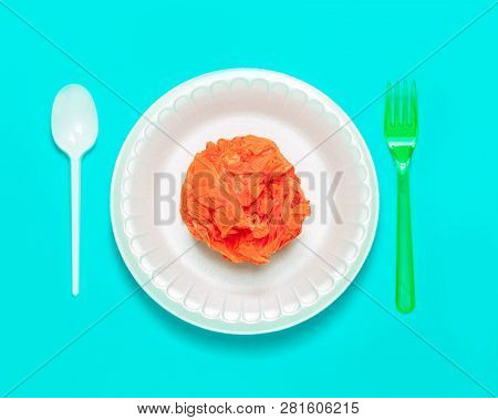 Plastic Cutlery And Plastic Bag In Plate. Setout With Plastic Garbage.